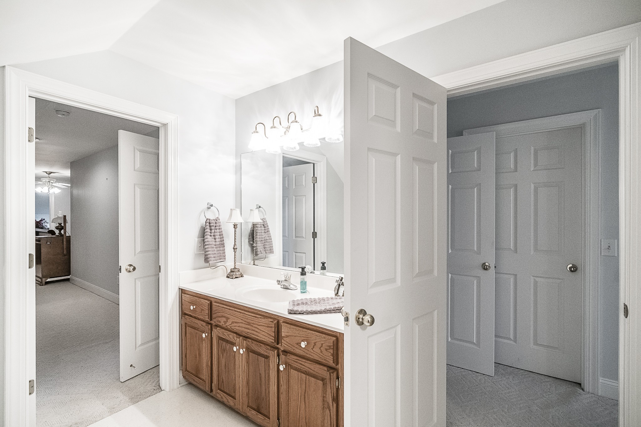 182 Calvert Ridge Road Westmoreland, TN 37186 - Photo 31 of 50 a bathroom with a double vanity sink mirror and double