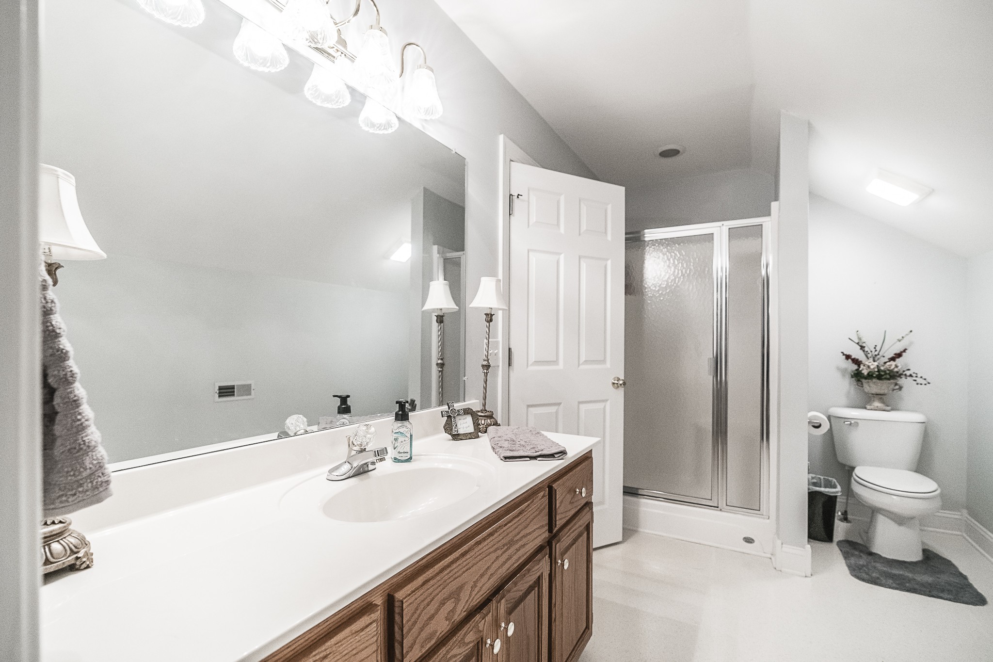 182 Calvert Ridge Road Westmoreland, TN 37186 - Photo 32 of 50 a bathroom with a sink a toilet and shower