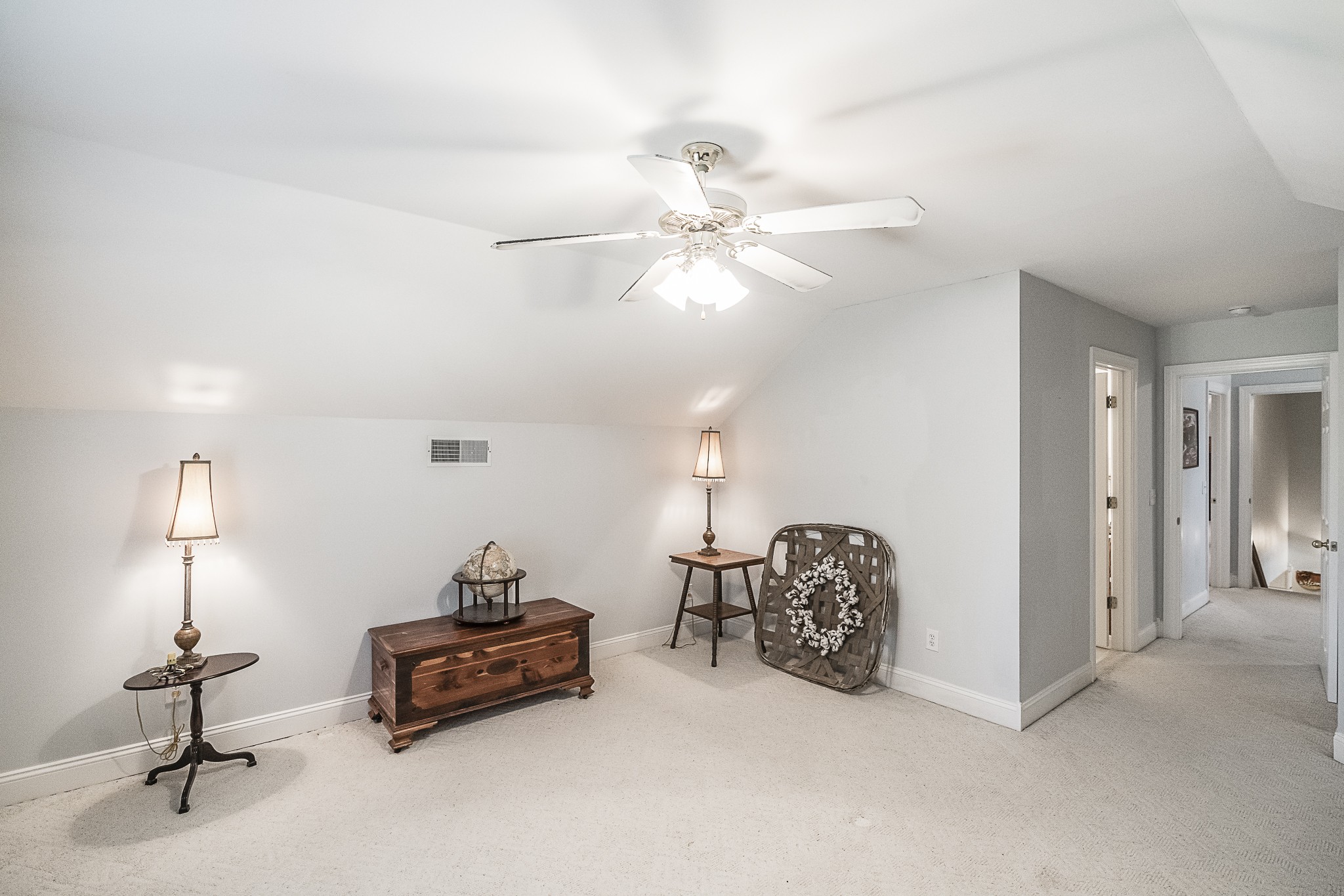 182 Calvert Ridge Road Westmoreland, TN 37186 - Photo 33 of 50 a bedroom with furniture and a chandelier