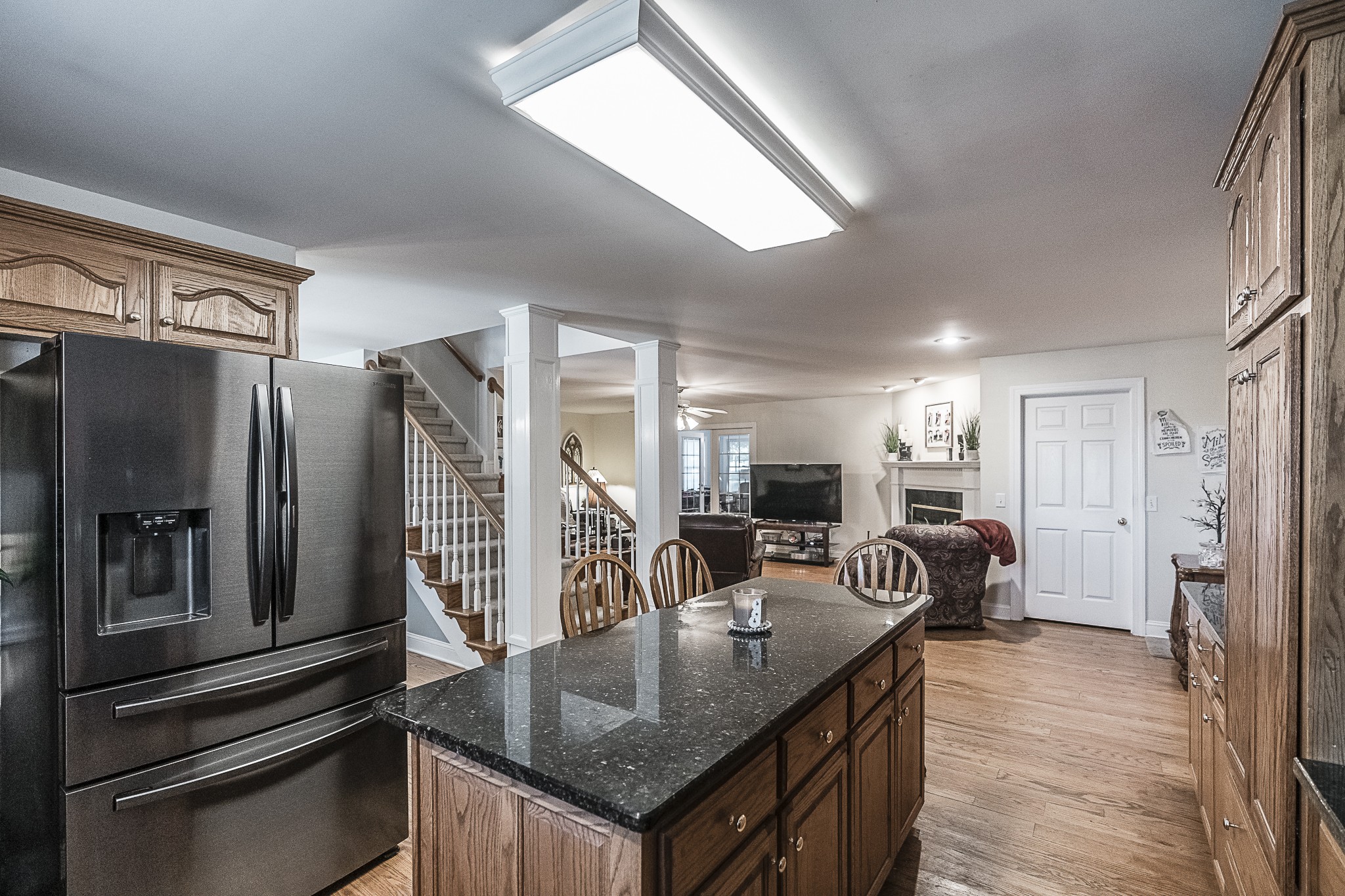 182 Calvert Ridge Road Westmoreland, TN 37186 - Photo 5 of 50 a kitchen with stainless steel appliances granite countertop a sink a stove and a refrigerator