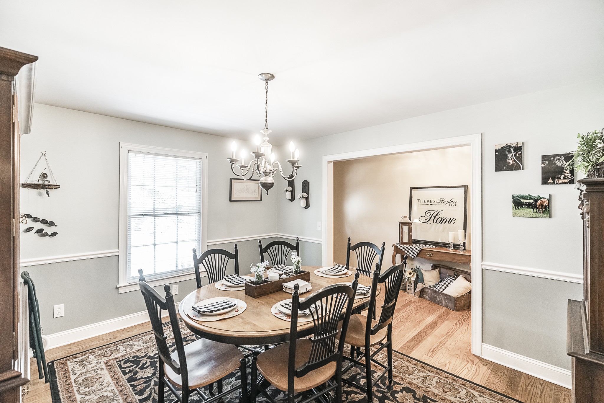 182 Calvert Ridge Road Westmoreland, TN 37186 - Photo 9 of 50 a view of a dining room with furniture a chandelier and wooden floor