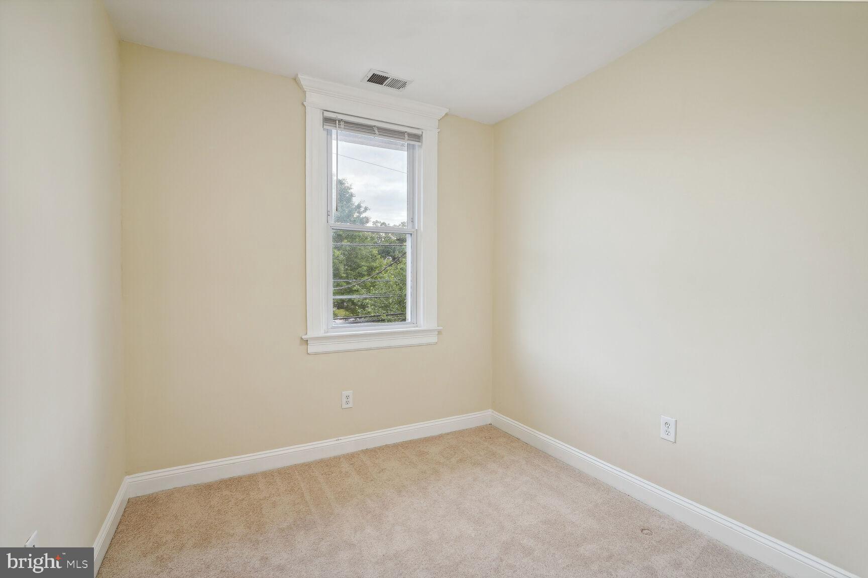 4528 4th Street Northwest Washington, DC 20011 - Photo 18 of 28 an empty room with a window