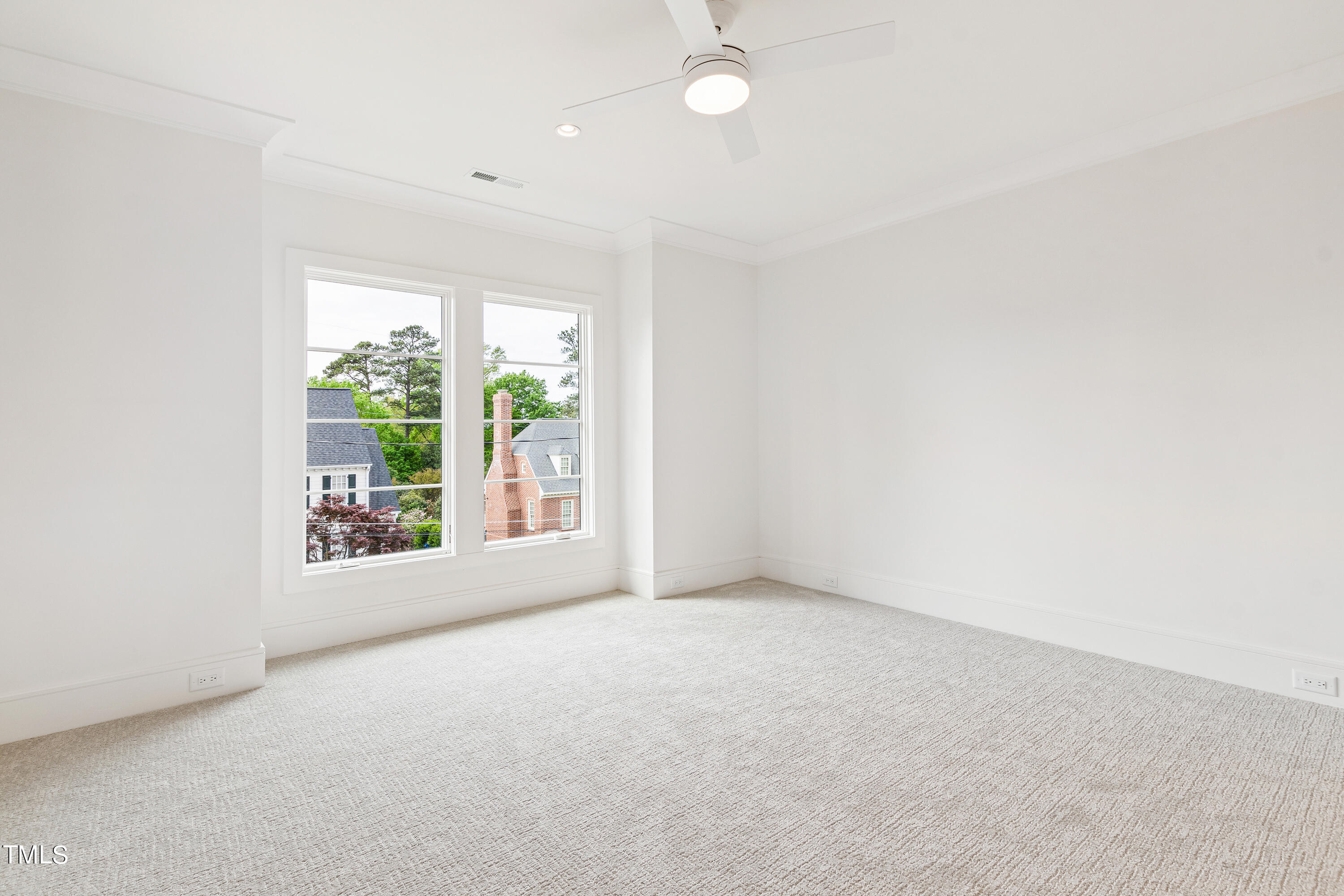 2604 Cromwell Road Raleigh, NC 27608 - Photo 54 of 74 a view of an empty room with a window