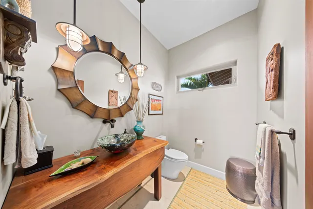 a room with furniture and a mirror