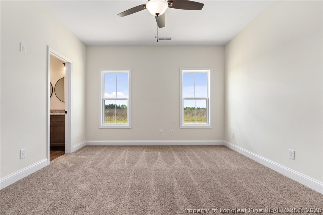 141 Libby Lane Raeford, NC 28376 - Photo 16 of 28 a view of an empty room with a window