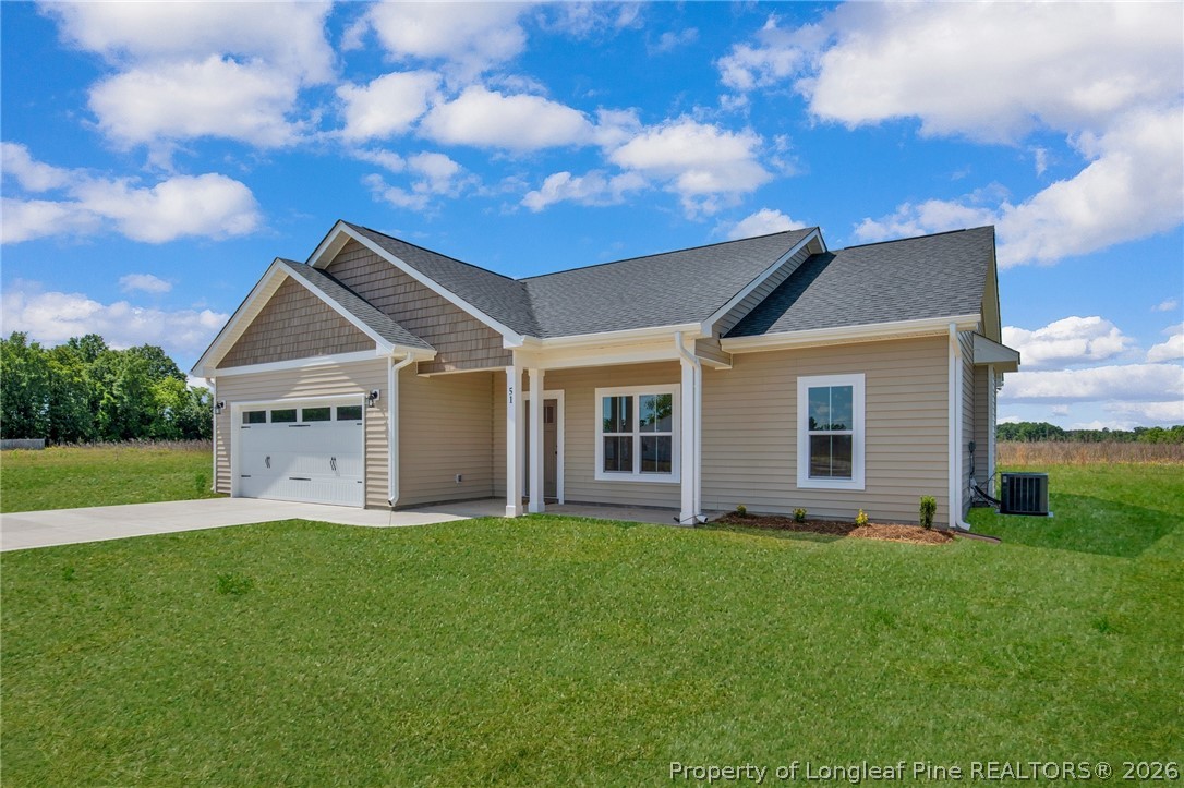 141 Libby Lane Raeford, NC 28376 - Photo 4 of 28 a front view of house with yard and green space