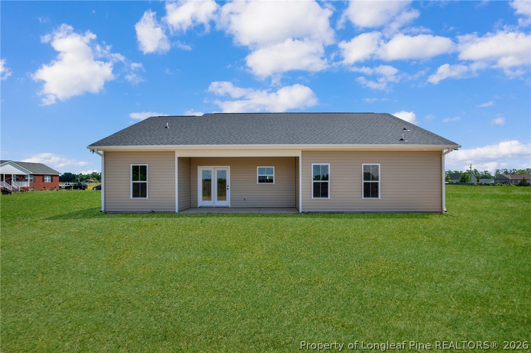 141 Libby Lane Raeford, NC 28376 - Photo 7 of 28 a view of a yard with a house