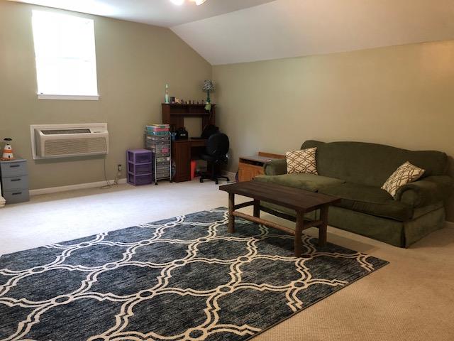 183 Lear Road Portland, TN 37148 - Photo 22 of 30 a living room with furniture and a rug