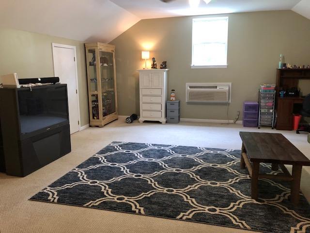 183 Lear Road Portland, TN 37148 - Photo 23 of 30 a bedroom with a bed and a television