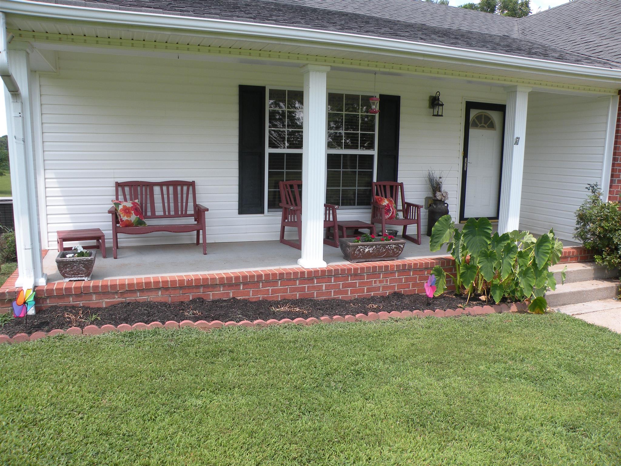 183 Lear Road Portland, TN 37148 - Photo 4 of 30 a front view of a house with a yard