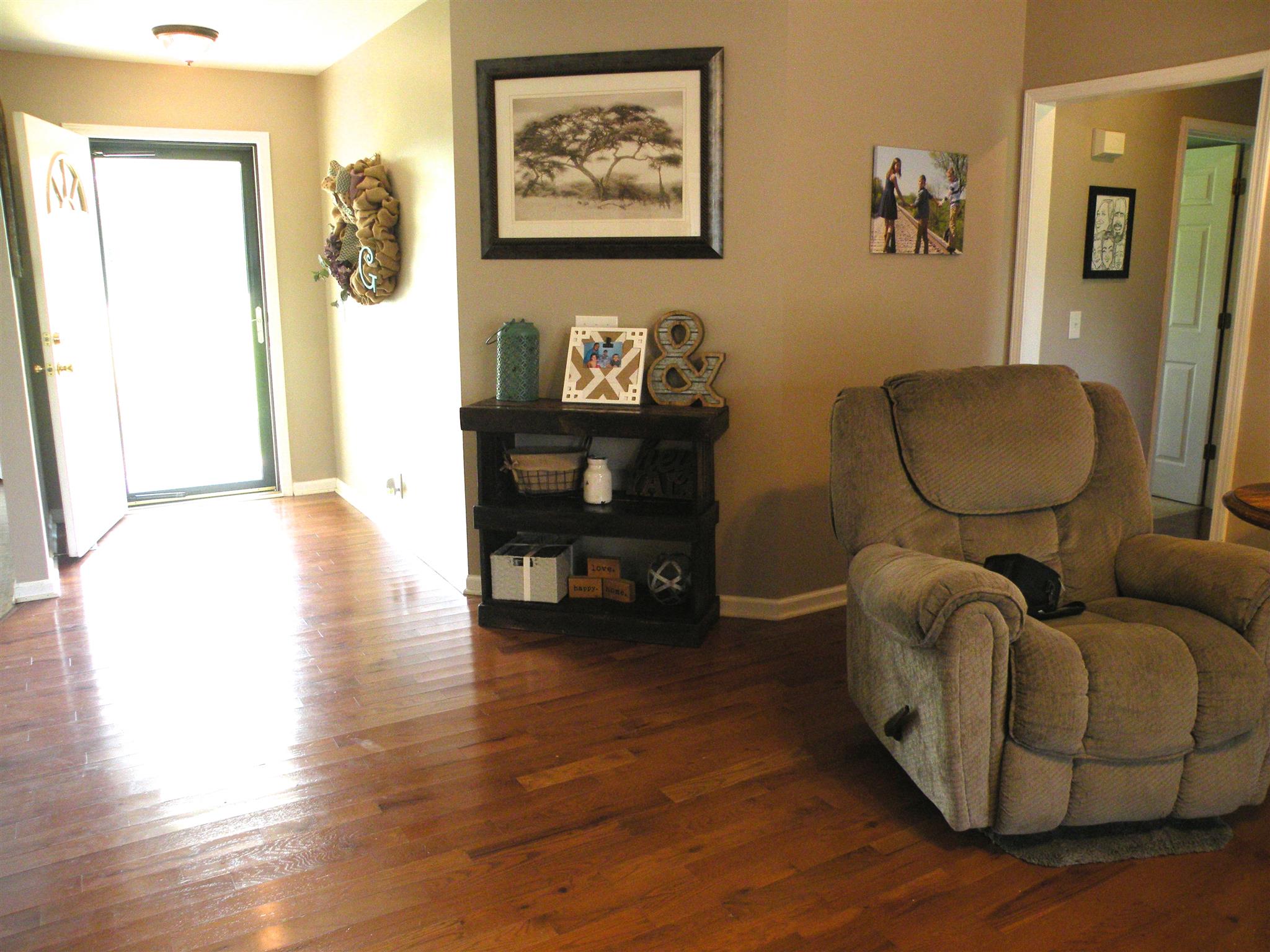 183 Lear Road Portland, TN 37148 - Photo 6 of 30 a living room with furniture and a wooden floor