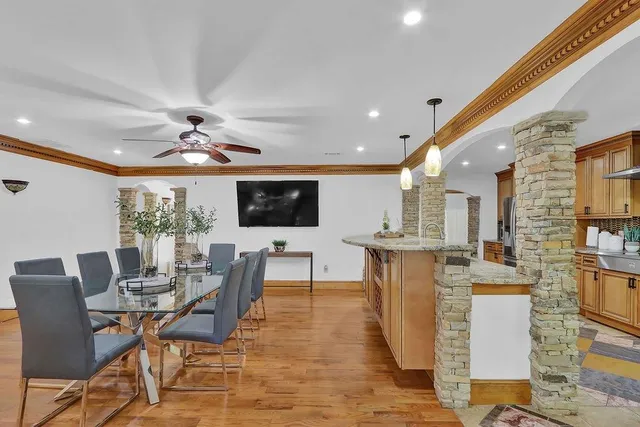 a front view of house with yard and outdoor seating