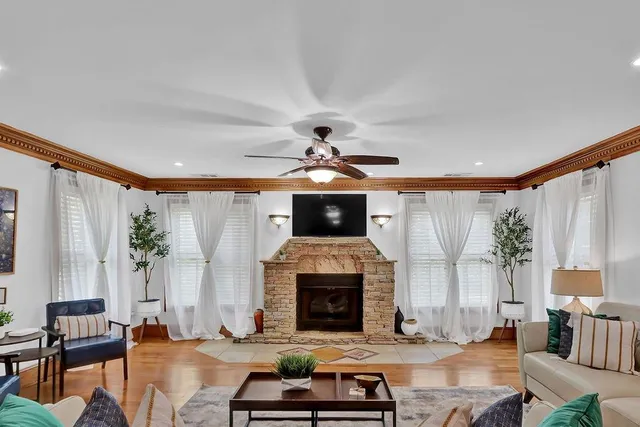 a living room with furniture and a table