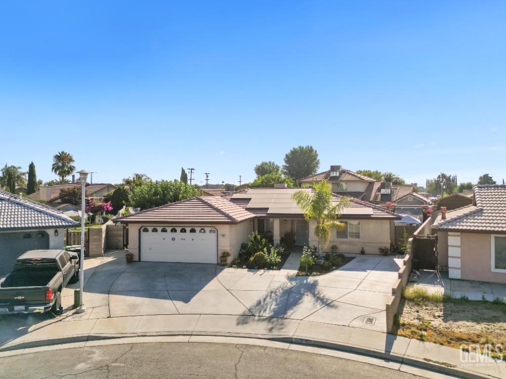 Undisclosed Address Shafter, CA 93263 - Photo 2 of 42 a view of a white house with wooden floor and city view