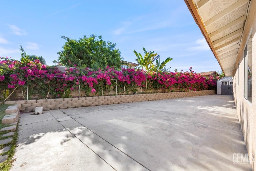 Undisclosed Address Shafter, CA 93263 - Photo 36 of 42 a street sign in front of a house