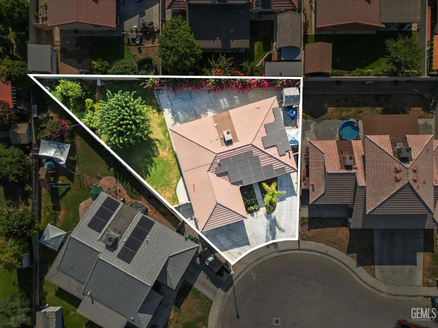 Undisclosed Address Shafter, CA 93263 - Photo 7 of 42 an aerial view of a house with garden space and sitting space