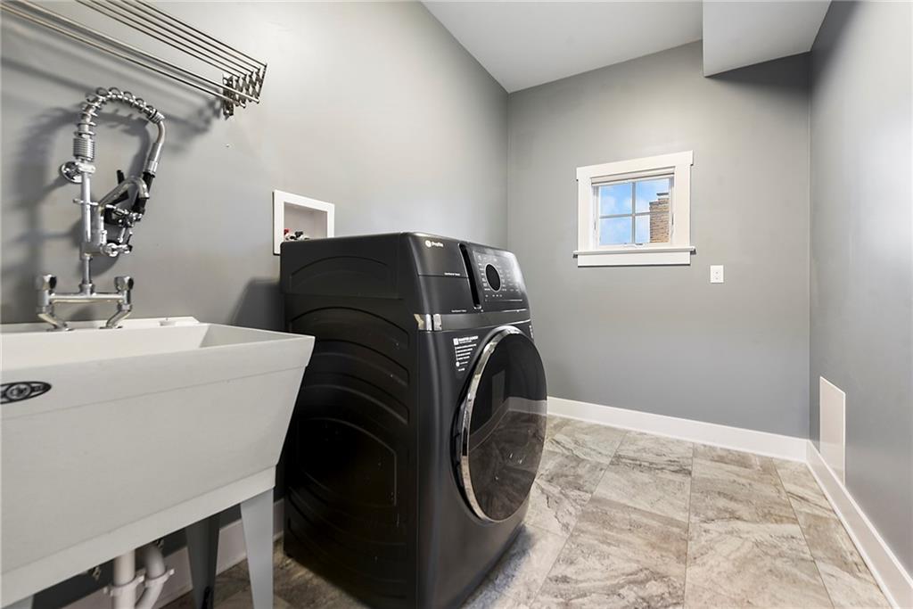 220 Bonnie View Drive Wexford, PA 15090 - Photo 16 of 50 1st floor laundry room with washer/dryer combo unit.