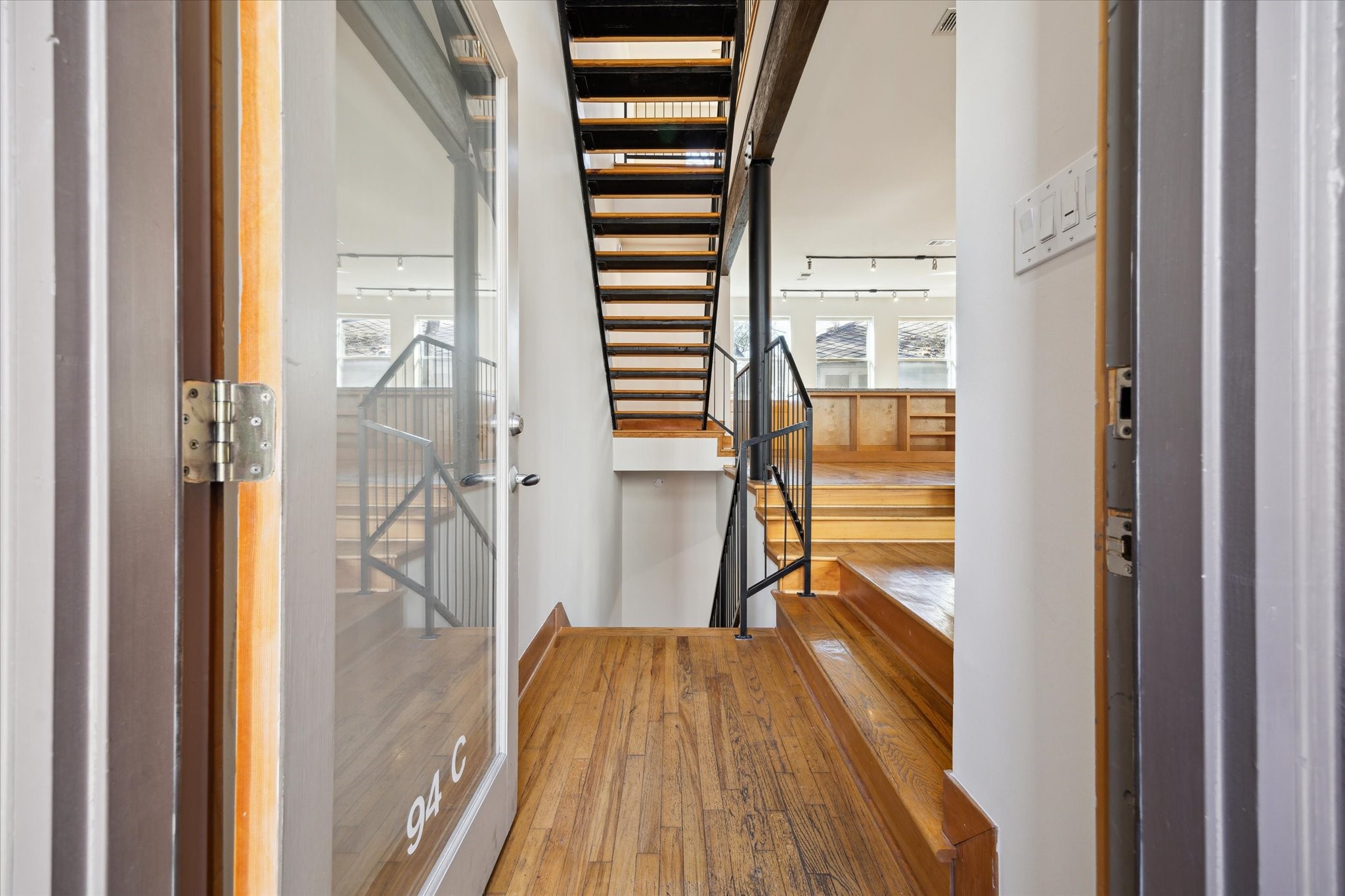94 Drew Street, Unit C Houston, TX 77006 - Photo 4 of 29 Rich wood flooring welcomes you home.