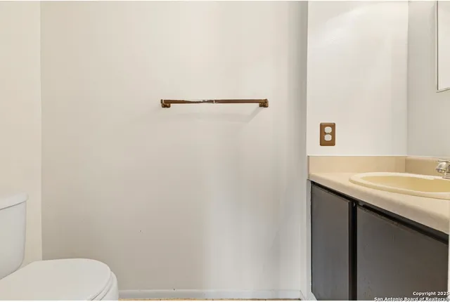 a bathroom with a sink and a toilet