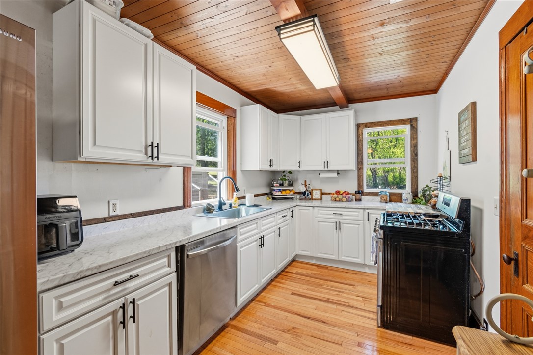 5443 Russell Road Marion, NY 14505 - Photo 13 of 48 Note the beautiful hardwoods in this kitchen space