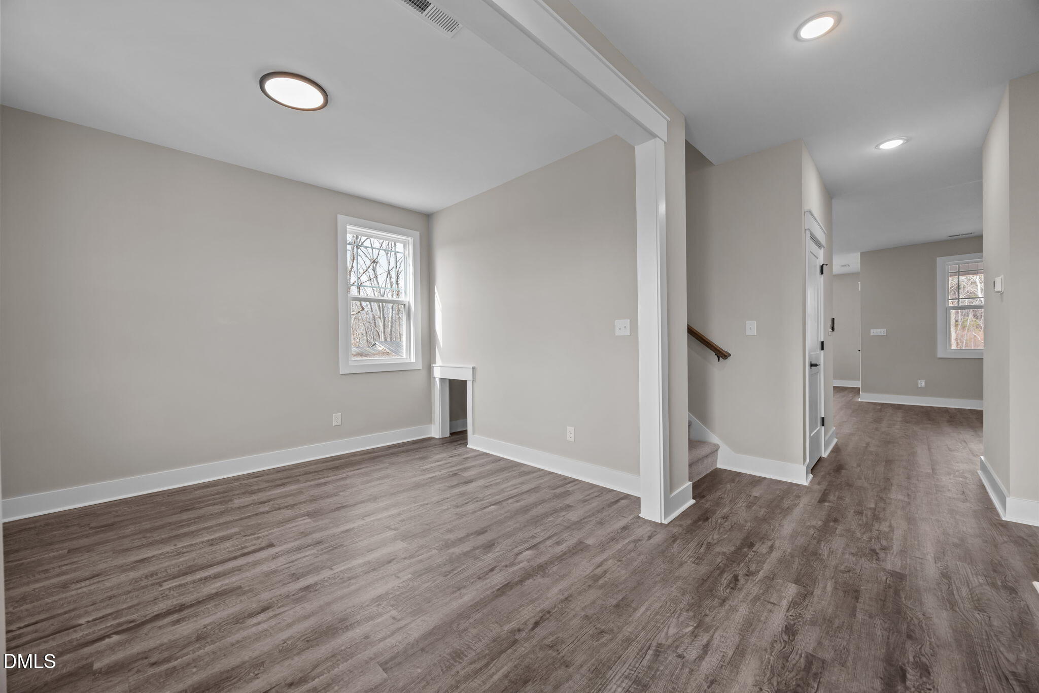 3917 Highway 42 Raleigh, NC 27603 - Photo 18 of 46 wooden floor in an empty room with a window