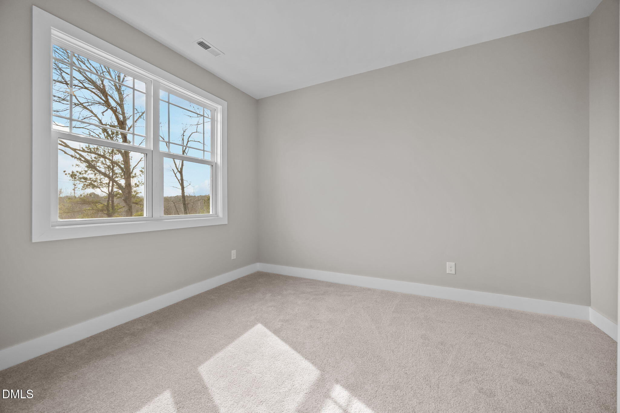 3917 Highway 42 Raleigh, NC 27603 - Photo 24 of 46 a view of an empty room with a window