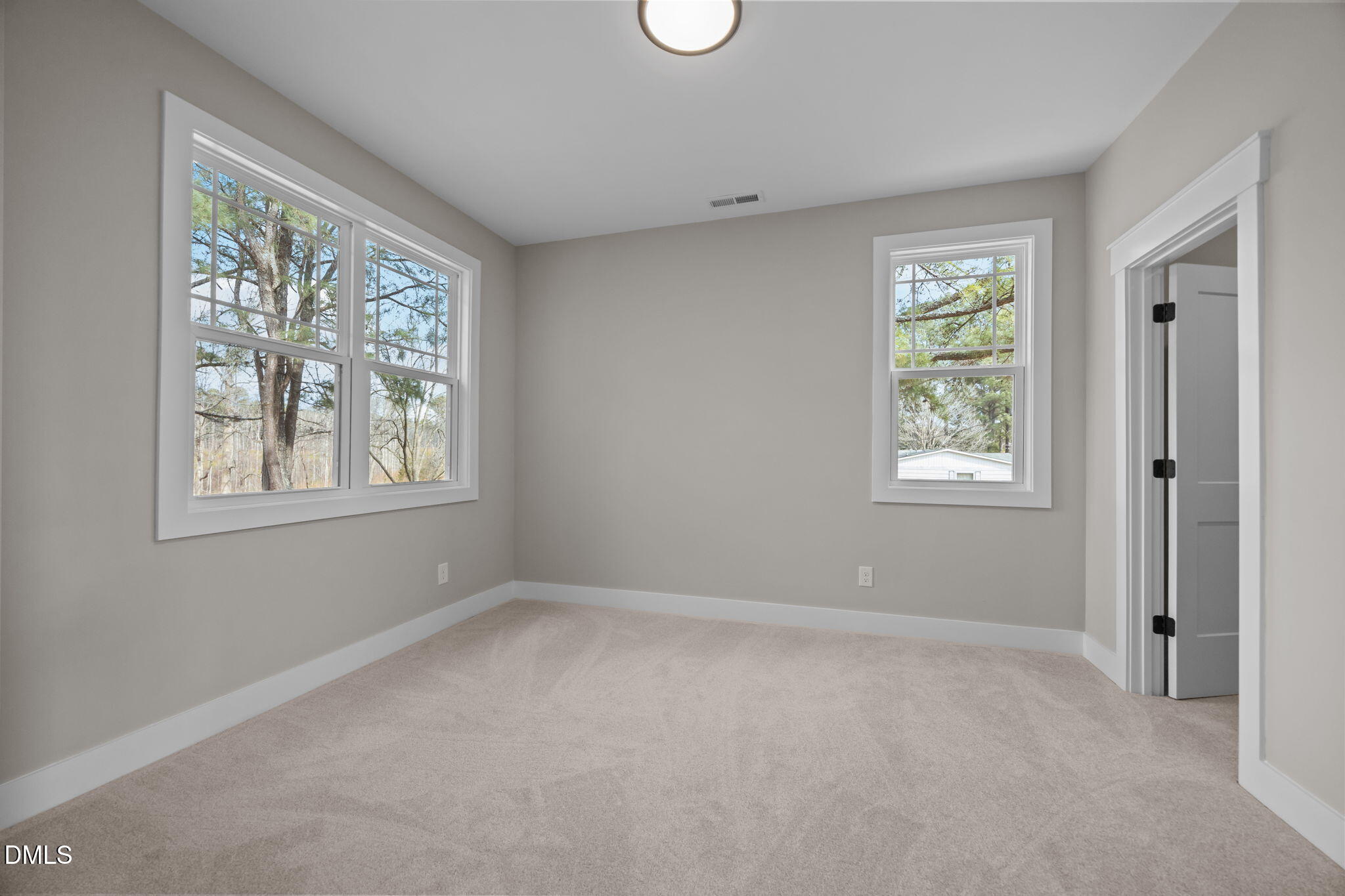 3917 Highway 42 Raleigh, NC 27603 - Photo 27 of 46 a view of an empty room with a window