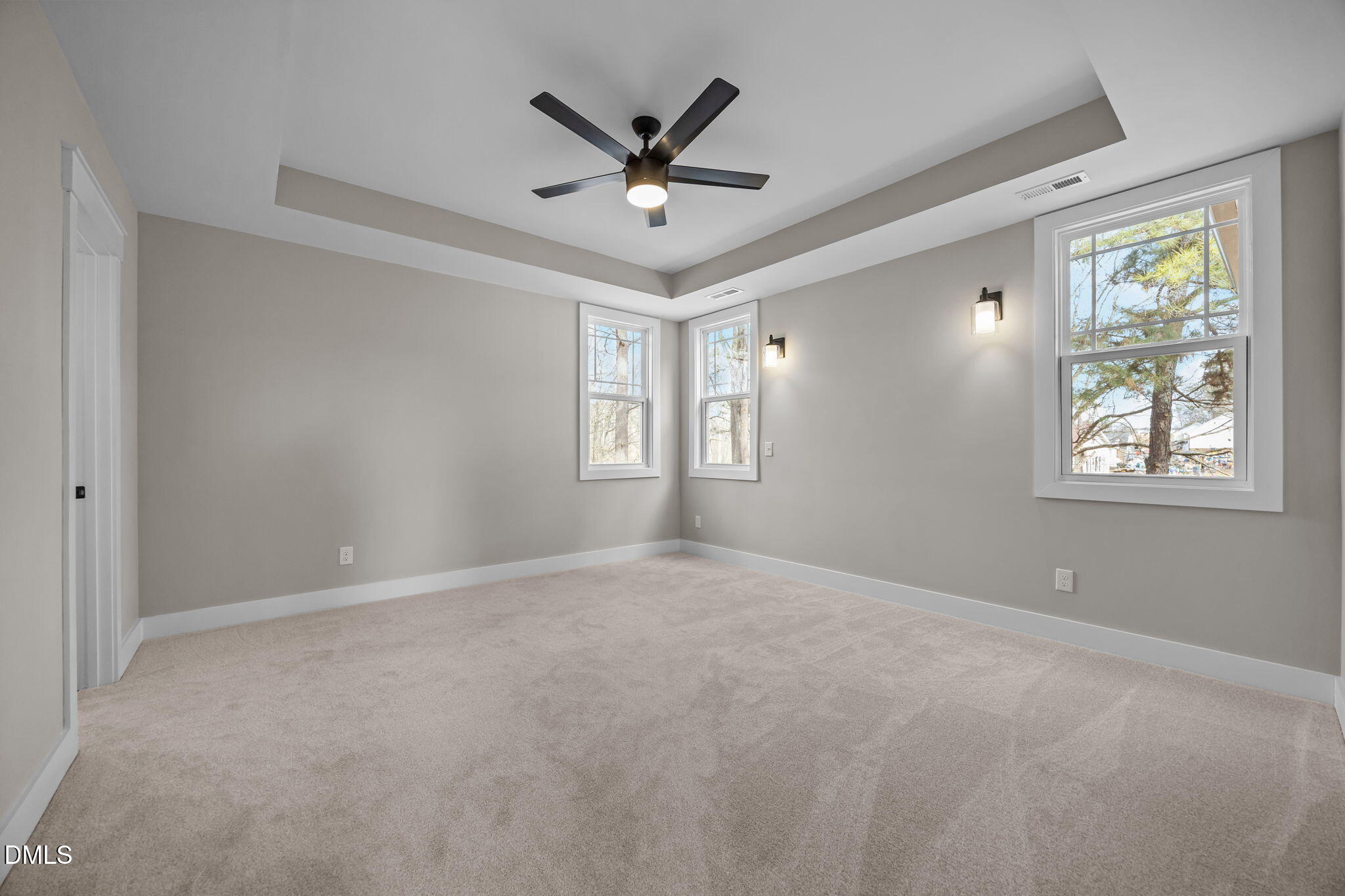 3917 Highway 42 Raleigh, NC 27603 - Photo 29 of 46 a view of a livingroom with a ceiling fan and window