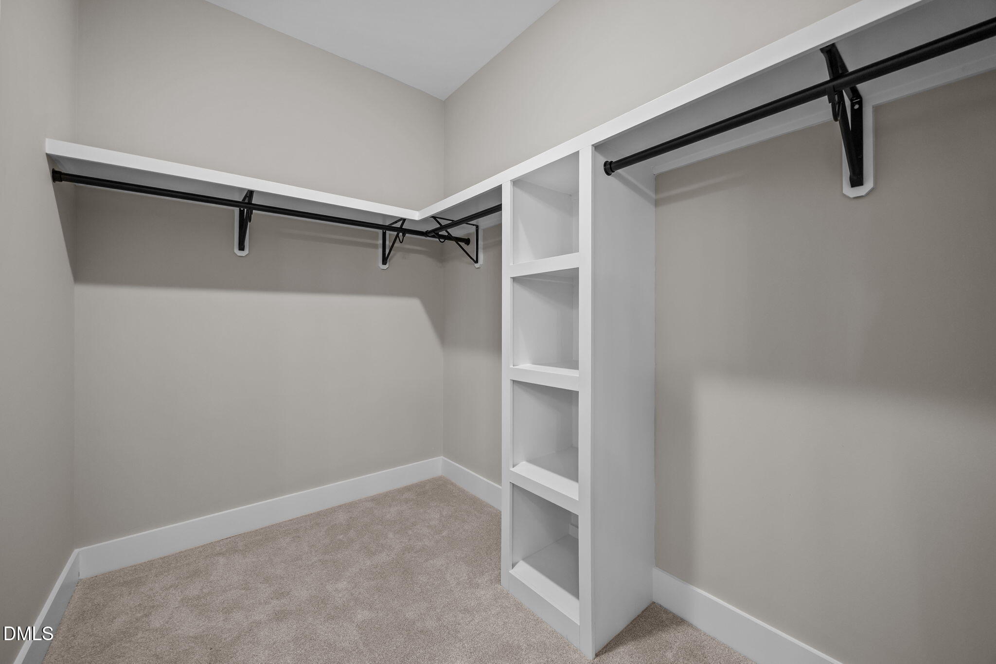 3917 Highway 42 Raleigh, NC 27603 - Photo 33 of 46 a view of walk in closet with empty racks