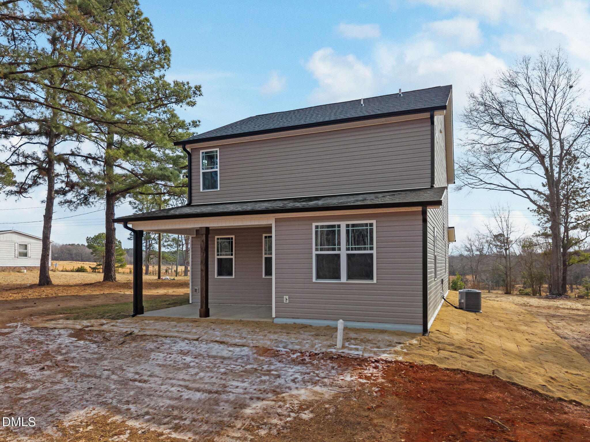 3917 Highway 42 Raleigh, NC 27603 - Photo 39 of 46 a house with trees in front of it