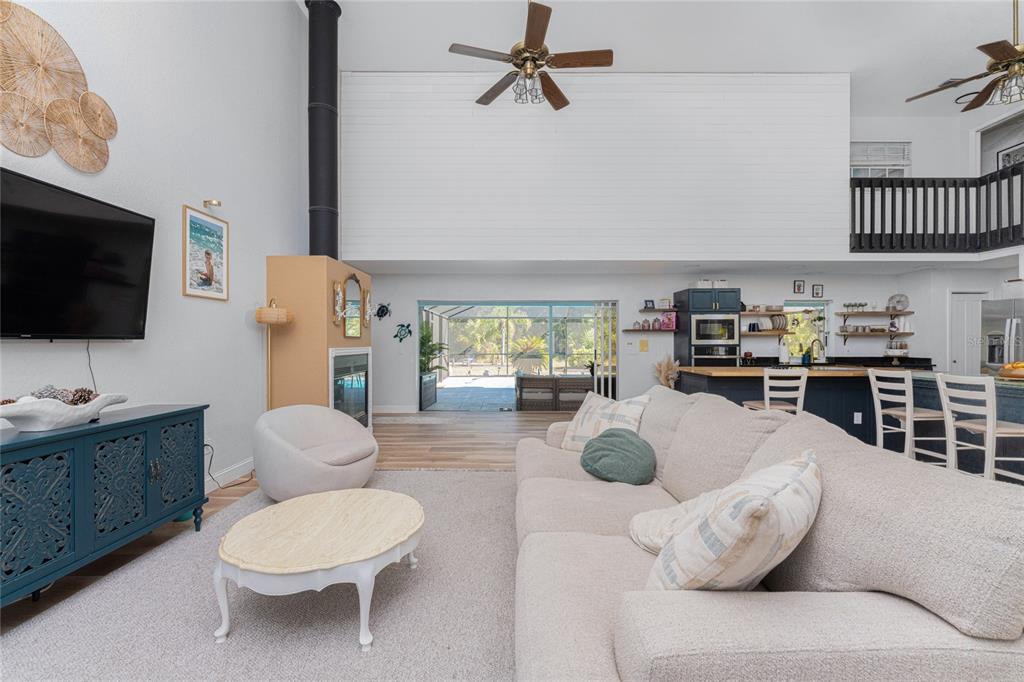 196 Lecturn Street Port Charlotte, FL 33954 - Photo 14 of 72 a living room with furniture and a flat screen tv