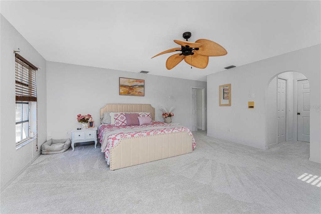 196 Lecturn Street Port Charlotte, FL 33954 - Photo 30 of 72 a bedroom with furniture and window