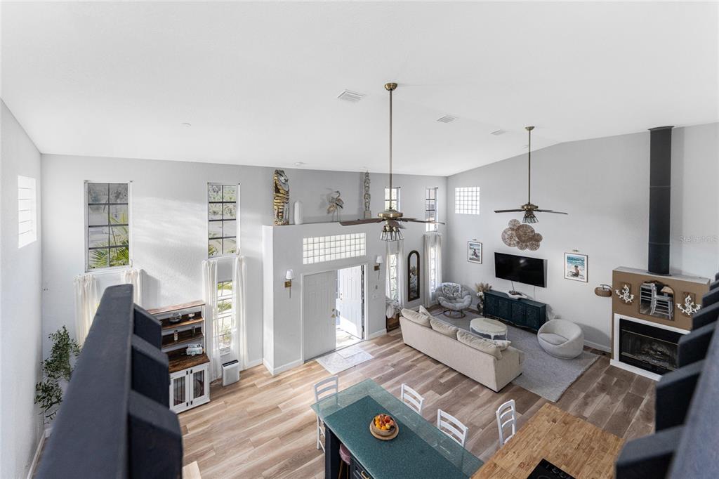 196 Lecturn Street Port Charlotte, FL 33954 - Photo 5 of 72 a living room with furniture and a flat screen tv