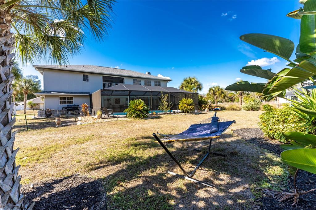 196 Lecturn Street Port Charlotte, FL 33954 - Photo 53 of 72 a view of swimming pool with a patio