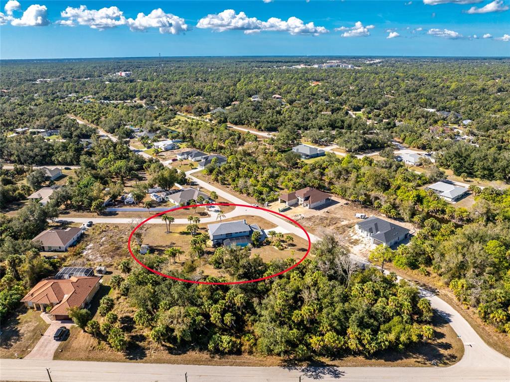196 Lecturn Street Port Charlotte, FL 33954 - Photo 71 of 72 an aerial view of residential houses with outdoor space