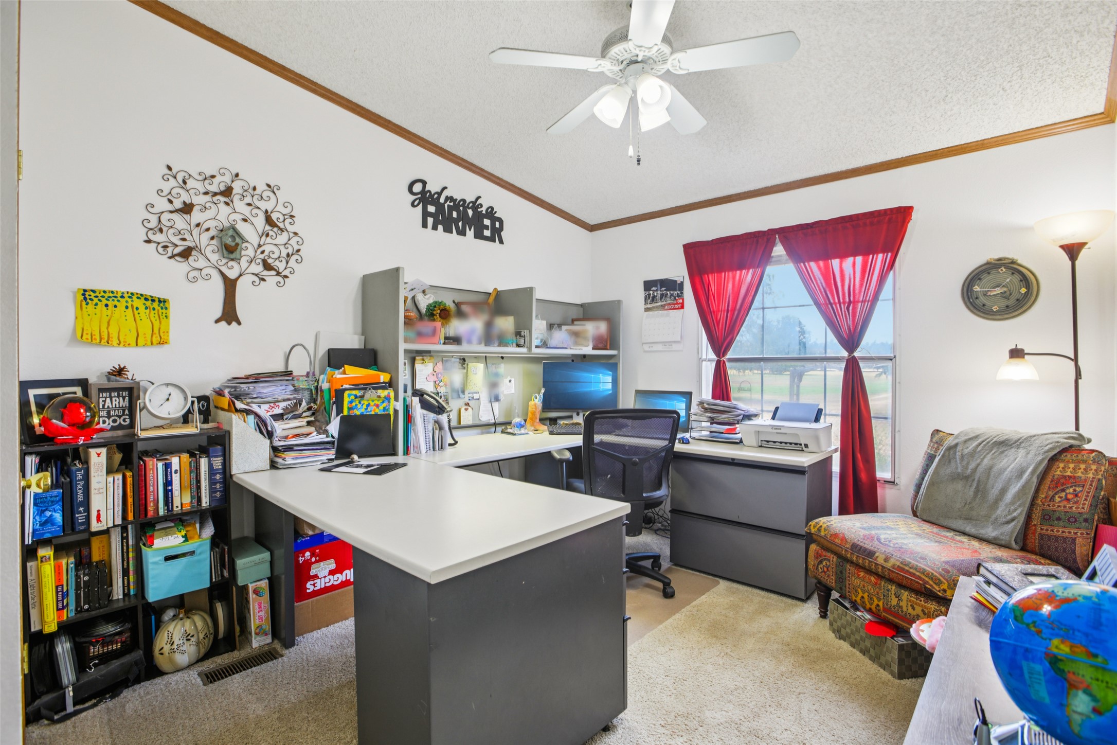 372 Hofferek Road Rosanky, TX 78953 - Photo 18 of 40 Home office featuring light colored carpet, a textured ceiling, crown molding, and ceiling fan
