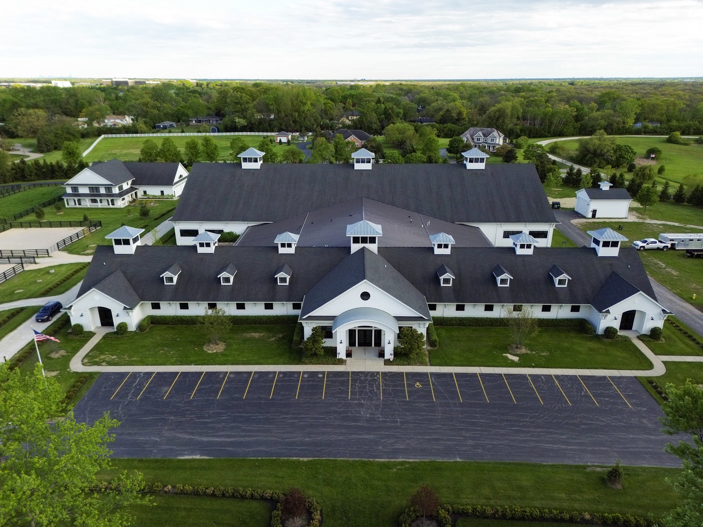 a aerial view of a house with a big yard
