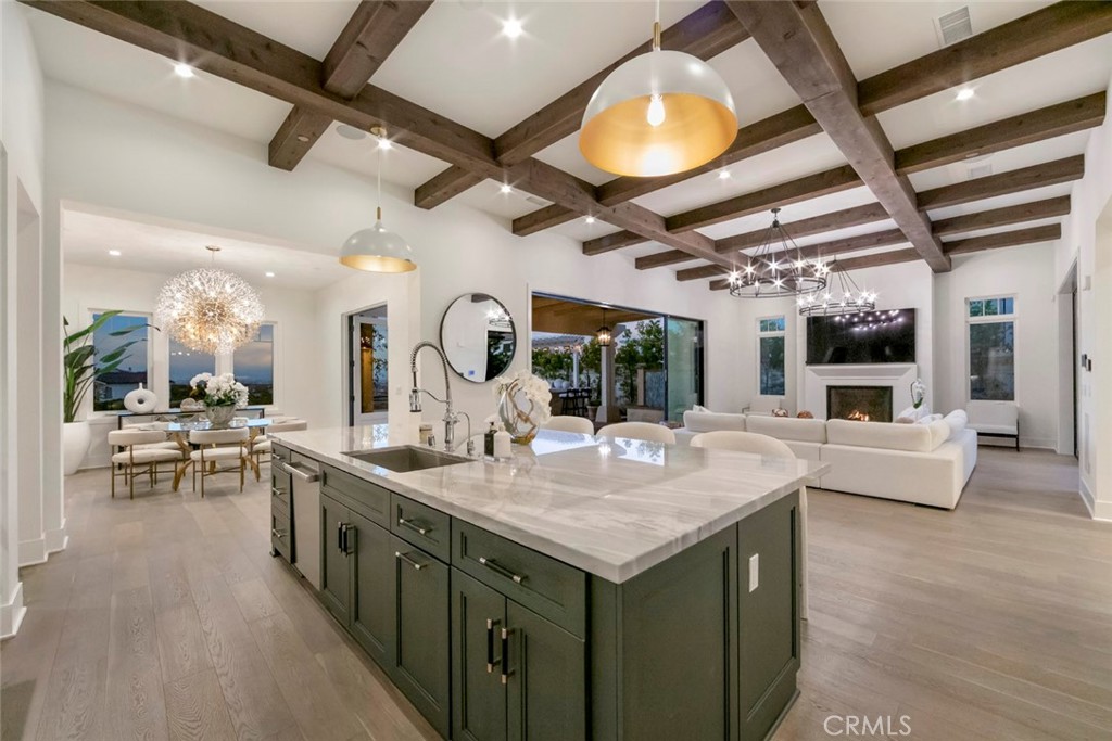 5 Rancho Elastico Road Rolling Hills Estates, CA 90274 - Photo 41 of 48 a kitchen with a stove and a view of living room