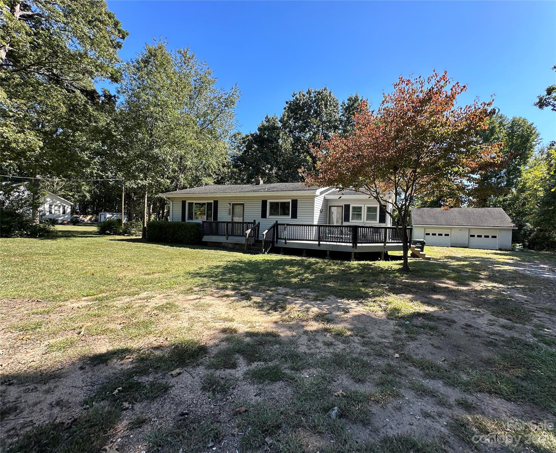 4205 Titman Road Gastonia, NC 28056 - Photo 2 of 16 a view of a house with a yard and sitting area