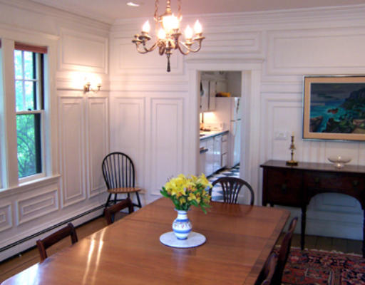 84 Salisbury Road Brookline, MA 02445 - Photo 5 of 16 a view of a dining room with furniture a chandelier and wooden floor