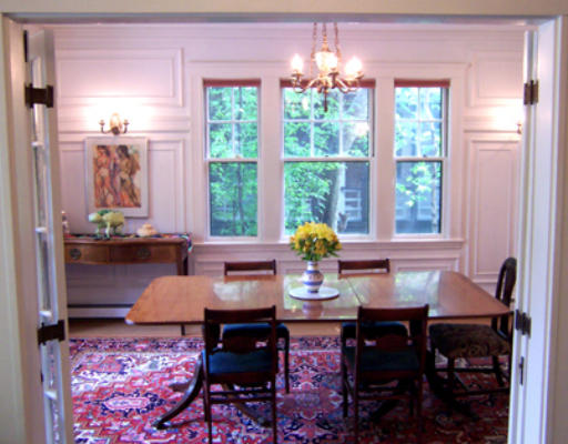 84 Salisbury Road Brookline, MA 02445 - Photo 6 of 16 a view of a dining room with furniture and chandelier