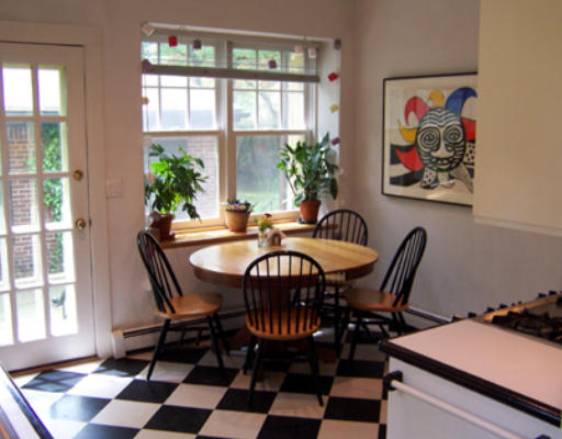 84 Salisbury Road Brookline, MA 02445 - Photo 7 of 16 a view of a dining room with furniture and window