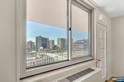 a view of a glass door with a large window