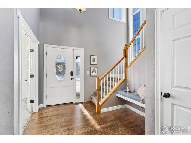 a view of entryway with wooden floor