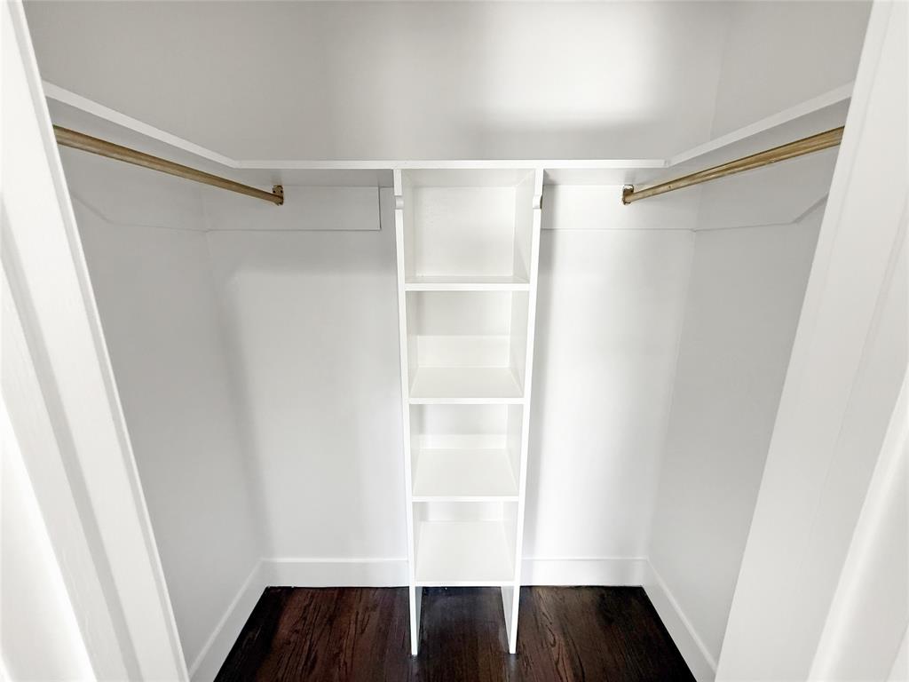 425 Chesier Road Lancaster, TX 75146 - Photo 14 of 15 a view of walk in closet with wooden floor