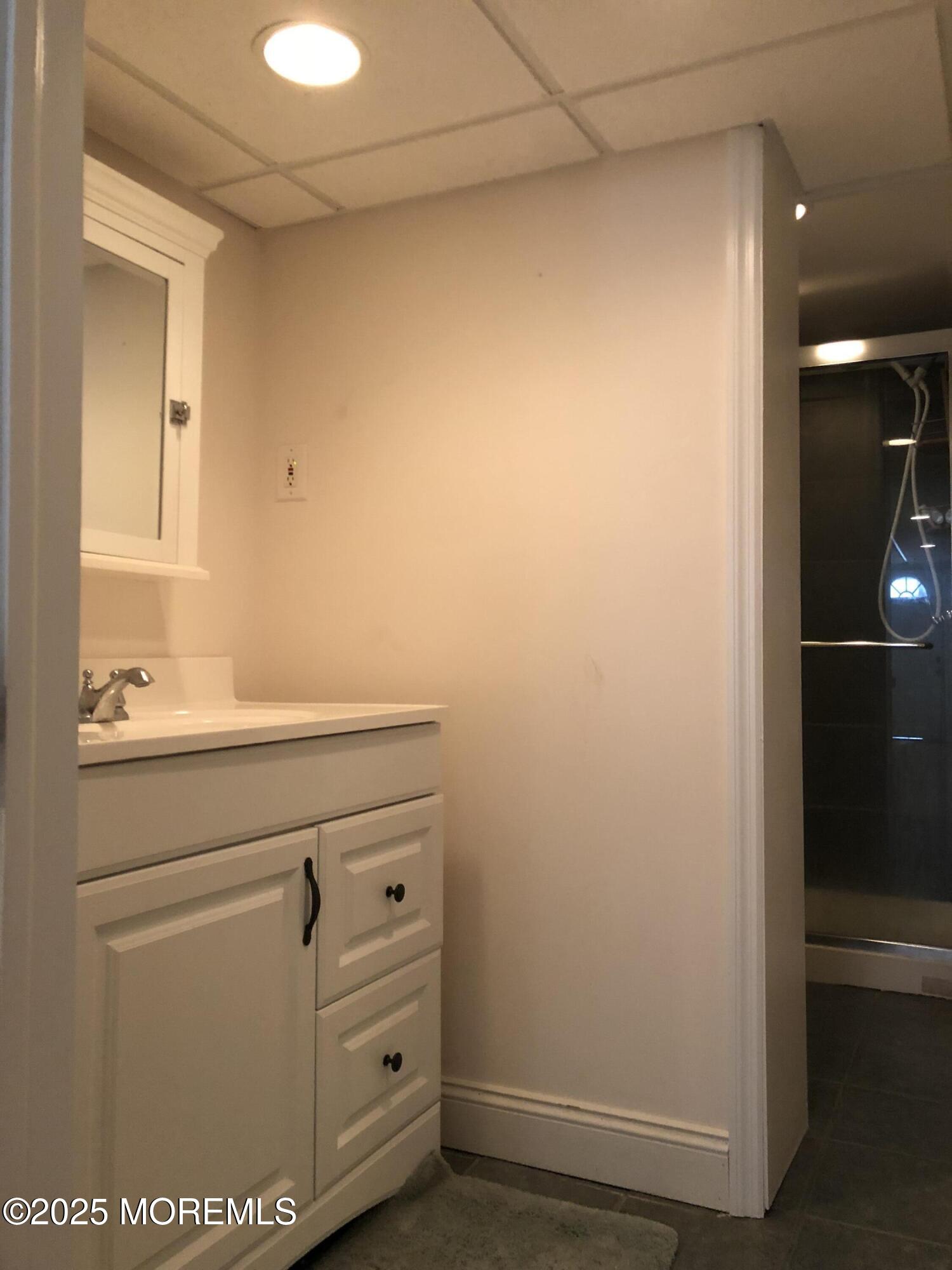 30 N Street Seaside Park, NJ 08752 - Photo 12 of 38 a room with a cabinets and a dresser