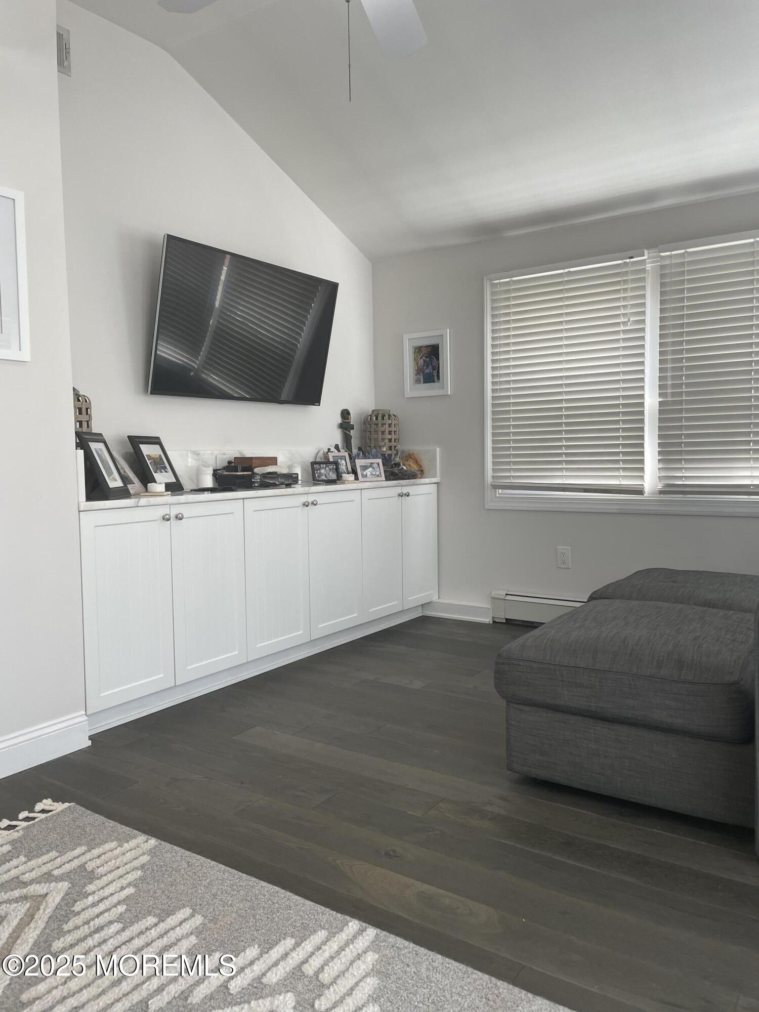 30 N Street Seaside Park, NJ 08752 - Photo 19 of 38 a living room with furniture and a flat screen tv