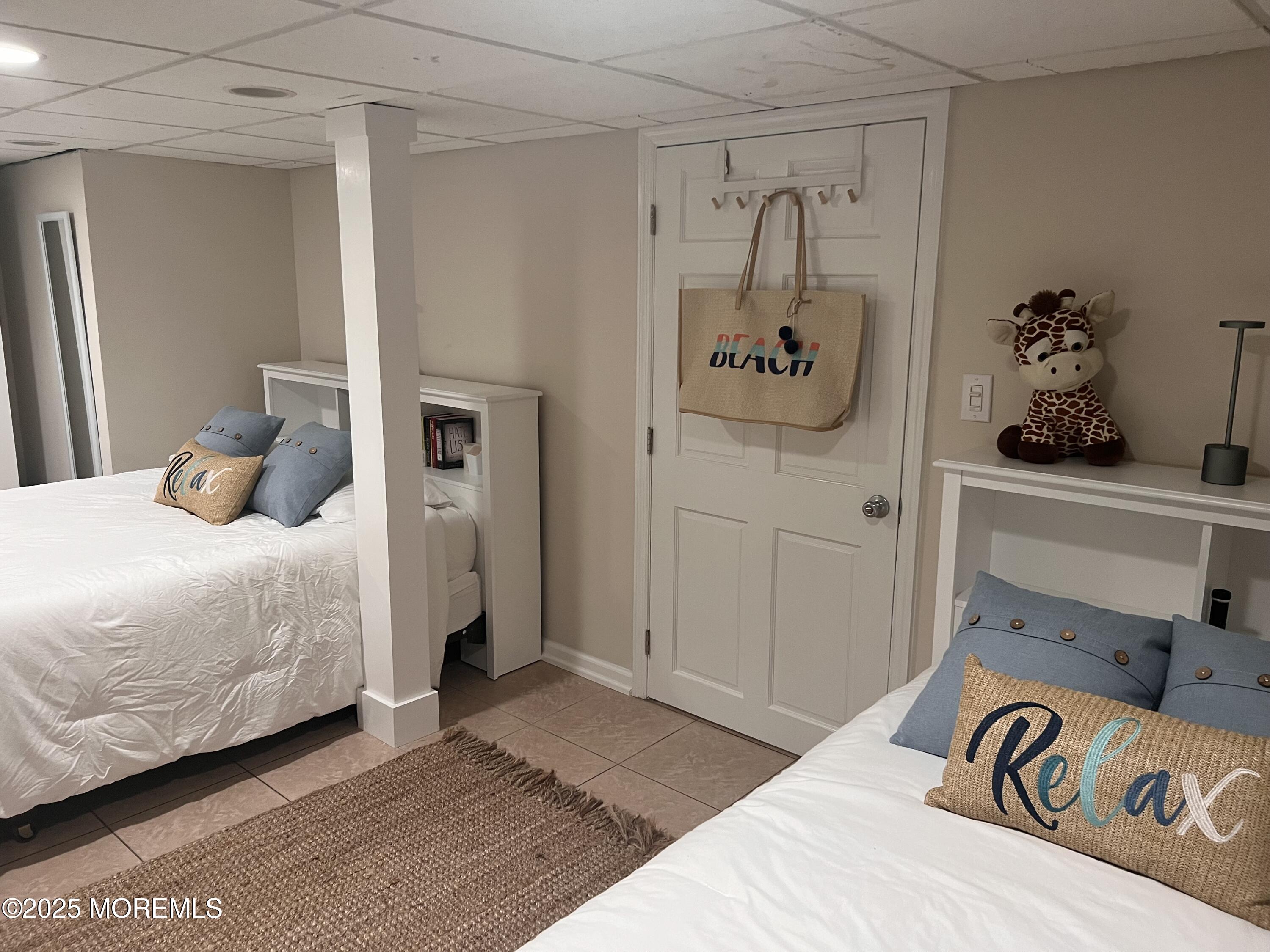 30 N Street Seaside Park, NJ 08752 - Photo 25 of 38 a bedroom with a bed and cabinets