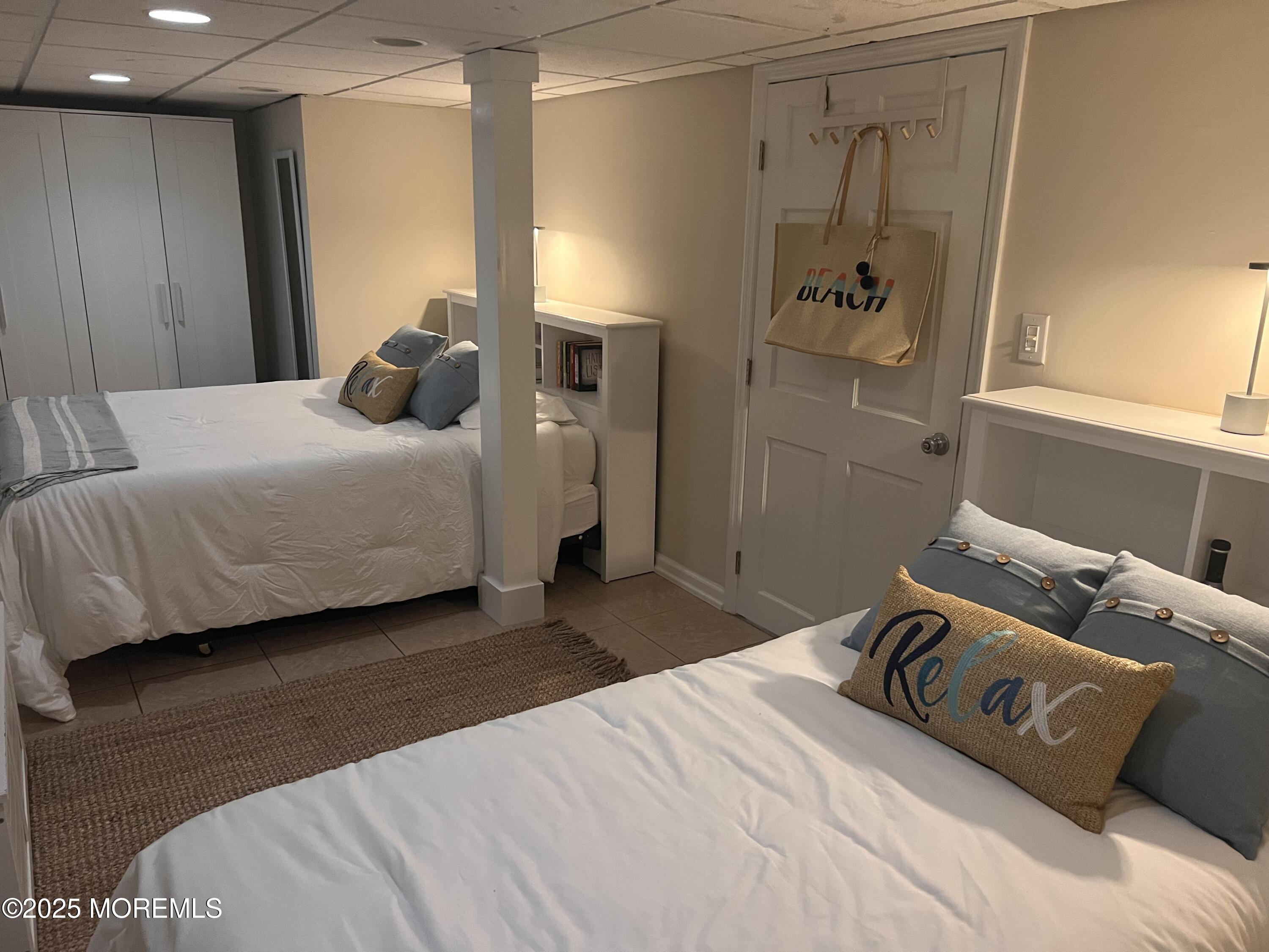 30 N Street Seaside Park, NJ 08752 - Photo 28 of 38 a bedroom with a bed and a window