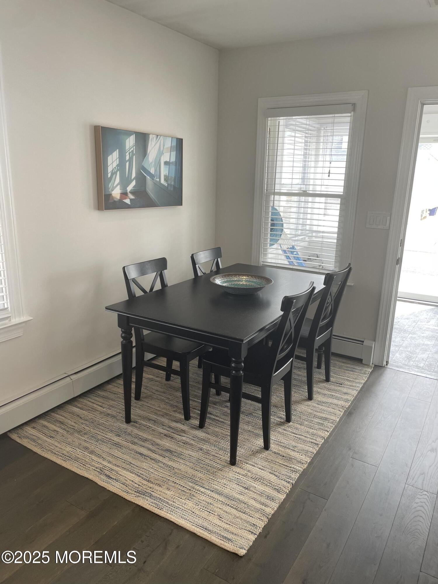 30 N Street Seaside Park, NJ 08752 - Photo 29 of 38 a view of a dining room with furniture window and wooden floor